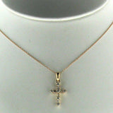 
  
  Small 14k Rose Gold Baguette and Round Diamond Cross Necklace
  
