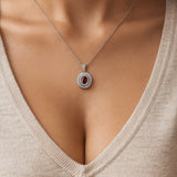 
  
  14k White Gold Diamond Halo and Oval Ruby Pendant Necklace
  
