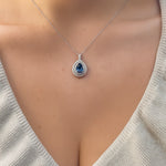 
  
  14k White Gold Diamond and Sapphire Double Halo Pendant
  
