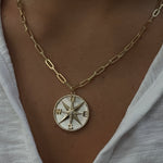 
  
  14K Yellow Gold Diamond and Mother of Pearl Compass Pendant
  
