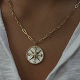 
  
  14K Yellow Gold Diamond and Mother of Pearl Compass Pendant
  
