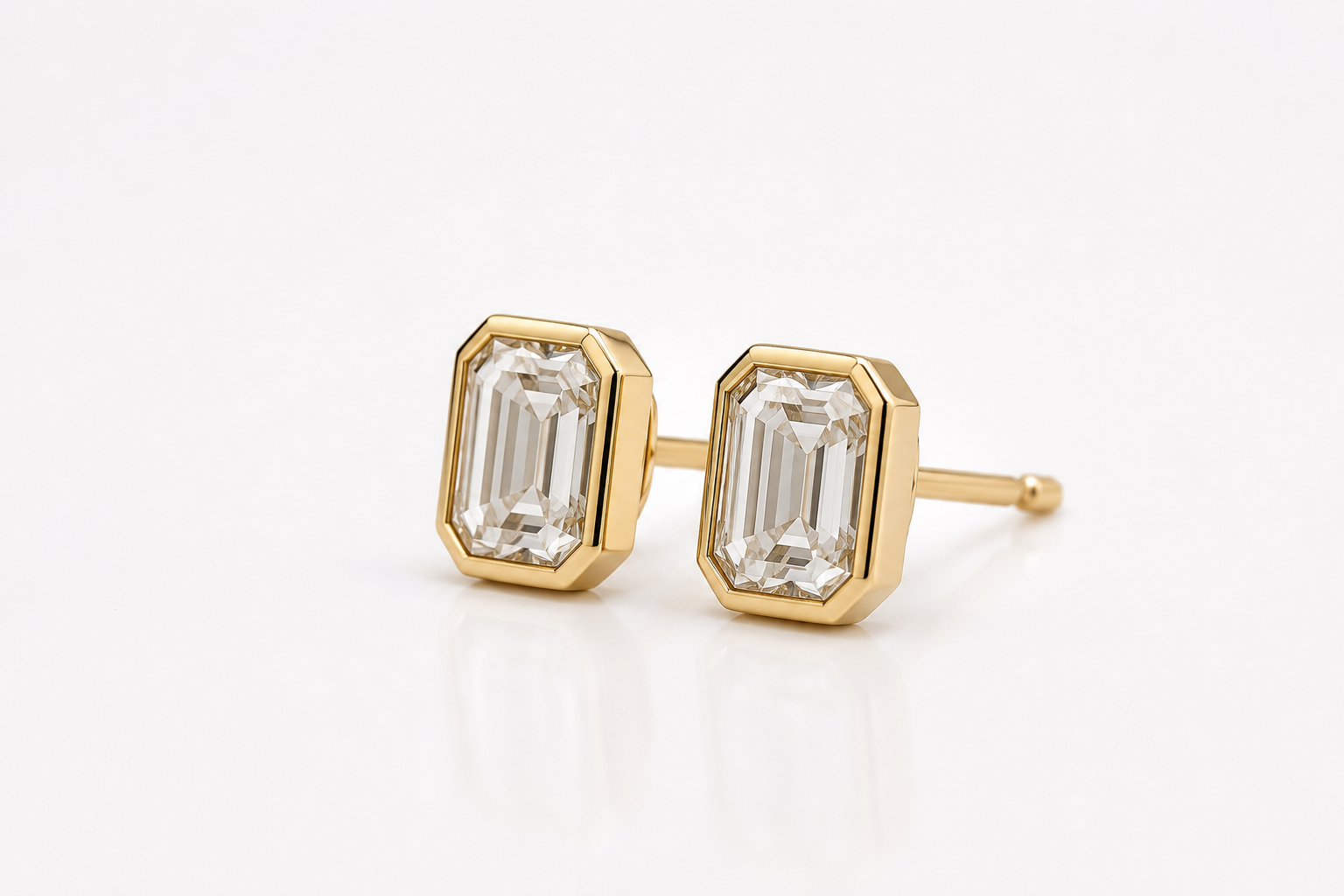 
  
  14KT Yellow Gold Lab Grown Emerald Cut Diamond Stud Bezel Set Earrings (0.50cts. t.w.)
  
