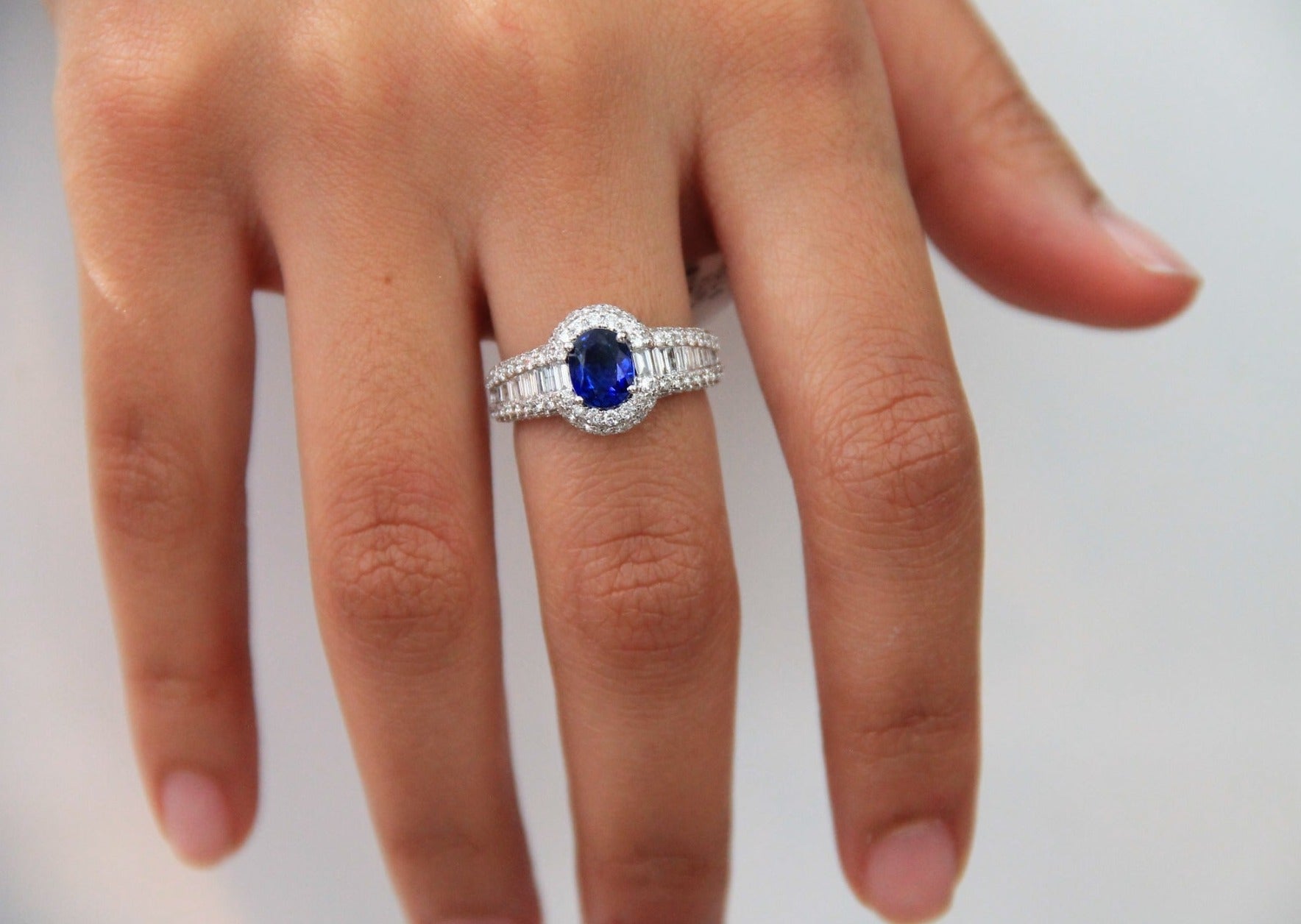 
  
  14k White Gold diamond and Sapphire Halo Ring
  

